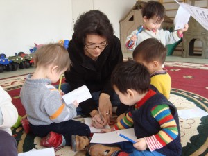 Jen coloring with orphans